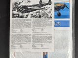 a newspaper with a picture of a plane on it