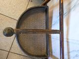 a chair that is sitting on a tile floor