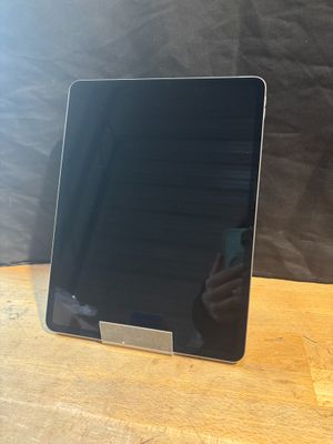 an image of a laptop computer sitting on top of a wooden table