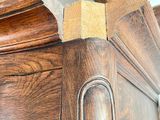 a close up of a piece of wood on the top of a cabinet