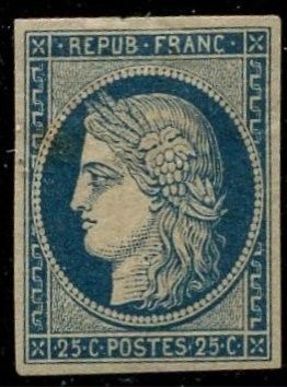 a close up of a stamp with a woman ' s face on it
