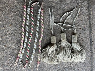 a picture of a rope and a pair of scissors on the ground