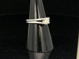 a close up of a ring on a cone on a black surface