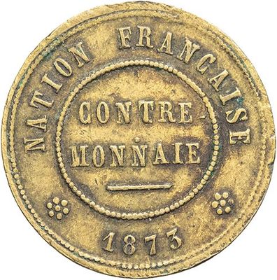 une pièce d'or sur laquelle figure l'image d'un homme