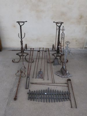 a lot of old metal items that are on the ground