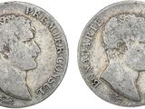 une pièce en argent avec l'image d'un homme de profil
