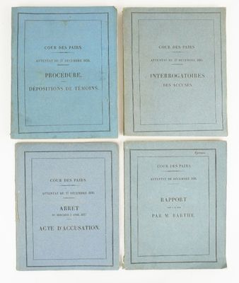 four books on a white surface with blue covers and black lettering