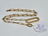 a close up of a chain with a tag attached to it