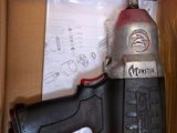 a box that has a drill in it on the floor