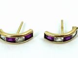 two tone gold and purple earrings with diamonds on them