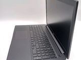 a laptop that is sitting on a white table