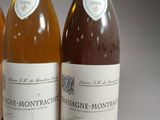 three bottles of wine sitting next to each other on a table