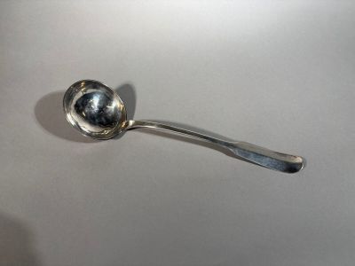 a spoon that is sitting on a table