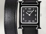 black leather watch with silver face and black leather band