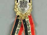 a close up of a medal with a ribbon around it
