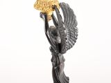 statue of a woman holding a basket of flowers in her hands
