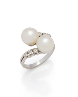 a white pearl and diamond ring
