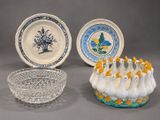 several different types of decorative dishes and bowls on a table
