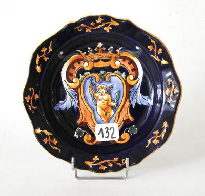 a blue plate with a picture of a cat on it