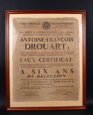 un vieux document encadré de bois sur fond noir