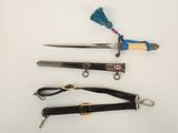 several different types of knives are displayed on a white surface