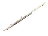 an image of a flute on a white surface with a white background