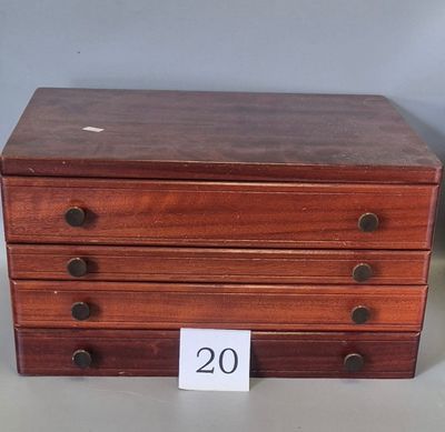 an old wooden chest of drawers with a price tag on it