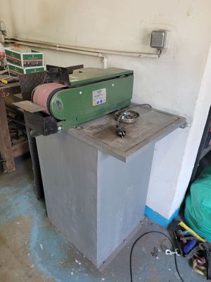 a machine that is sitting in a room next to a table