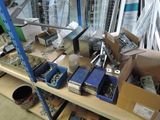many boxes of assorted items on a shelf