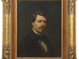 a painting of a man with a mustache in a gold frame