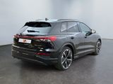 the rear end of a black 2020 audi qx