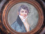 painting of a man in a black coat and white shirt