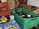 boxes of wine are stacked on top of each other in a room