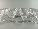 a group of wine glasses that are sitting on a table