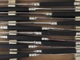 a lot of knives in a box on the table