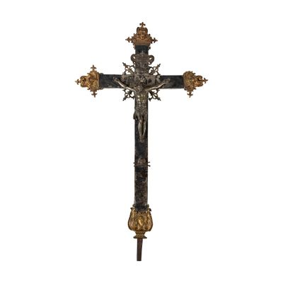 an old cross with a gold decoration on it on a white background