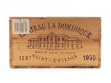 a wooden box with a label on it that says chateau dominque