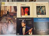 a lot of music books on the table