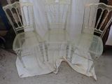 three chairs are sitting next to each other in front of a white curtain