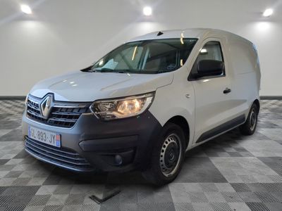 the white van is parked on a checkered floor in a room