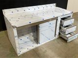 a white desk with drawers and drawers on it