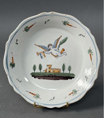 a white plate with a picture of a bird on it