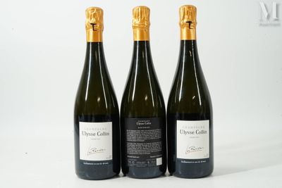 trois bouteilles de vin posées l'une à côté de l'autre sur une table