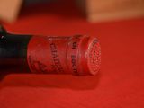 a bottle of wine that is sitting on a table