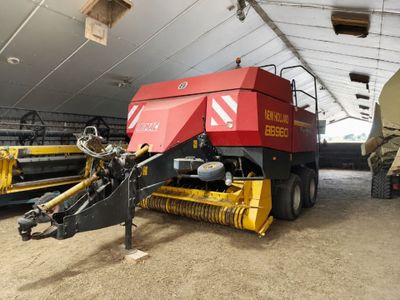 a tractor that is parked inside of a building