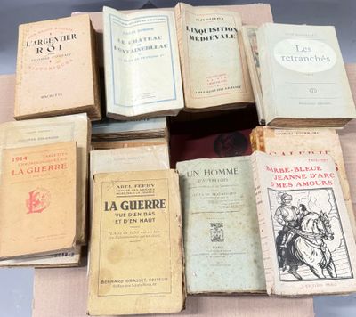 many books that are sitting on top of a table