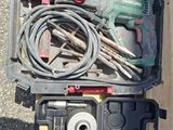 a tool box with tools in it on the ground
