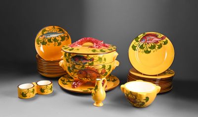 many plates and bowls that are sitting on a table