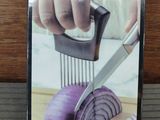 a picture of a picture of a person cutting an onion