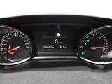 a close up of a car dashboard with various gauges